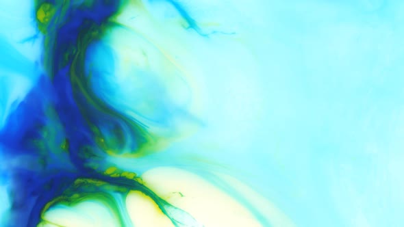 Moving Background Consisting of Blue and Green Particles of the Current Paint on a White Background