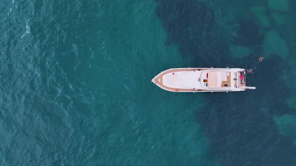 A large yacht stands at sea aerial view 4 K