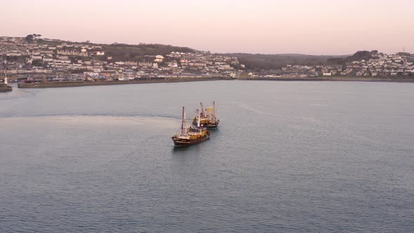 Fishing Trawlers at Sea in the Early Morning Aerial View
