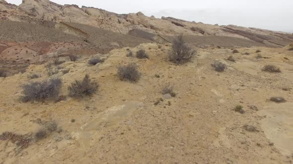 Flying low over the desert towards San Rafael Reef