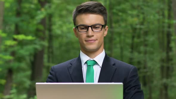 Young Male Feeling Relaxed at Work Anti-Stress Breathing Exercises, Concept