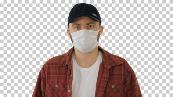 American man in cap and face mask walking, Alpha Channel