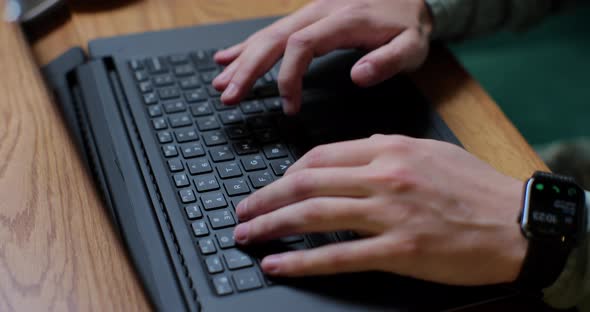 Close Up Male Hands Typing on Personal Computer