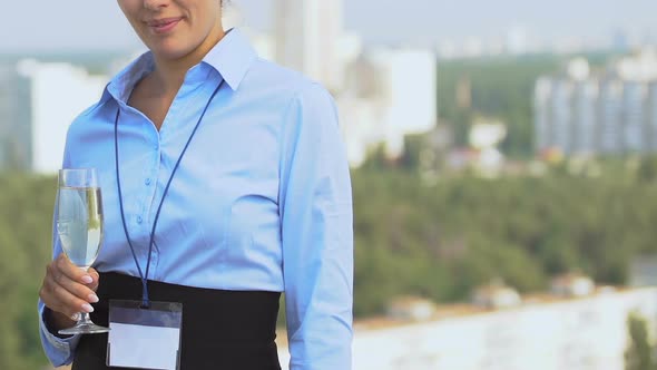 Happy Business Lady With Champagne Glass Smiling on Camera, Outdoor Conference