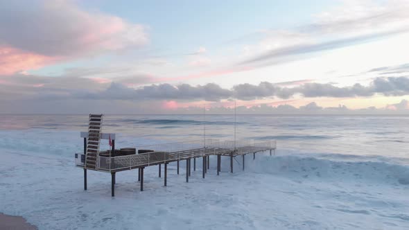 Sunset over sea. Beautiful sea sunset with dramatic cloudy pink sky