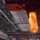 The Crane Gives Out a Mold of Molten Steel and Puts It on a Trolley for Transportation - VideoHive Item for Sale
