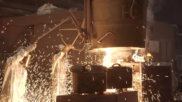 Metal Smelting Furnace in Steel Mill. Molten Metal Pouring, Metallurgy, Steel Casting Foundry