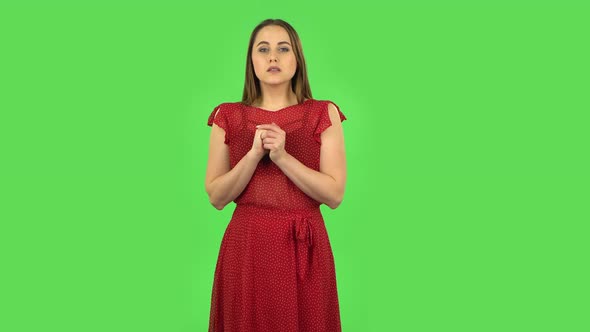 Tender Girl in Red Dress in Anticipation of Worries, Then Disappointed and Upset. Green Screen