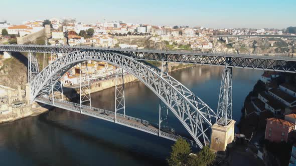 View of Dom Luís I Bridge in Porto, Portugal - Aerial push in shot