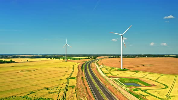 Aerial view of wind turbines and highway in Poland