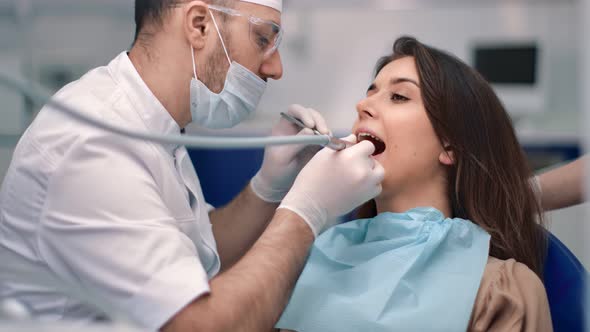 Smiling Woman Patient of Dentistry After Treatment Tooth