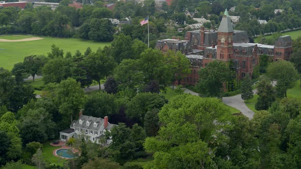 Flying Away From a Historic Gothic Revival Architecture Building in Garden City