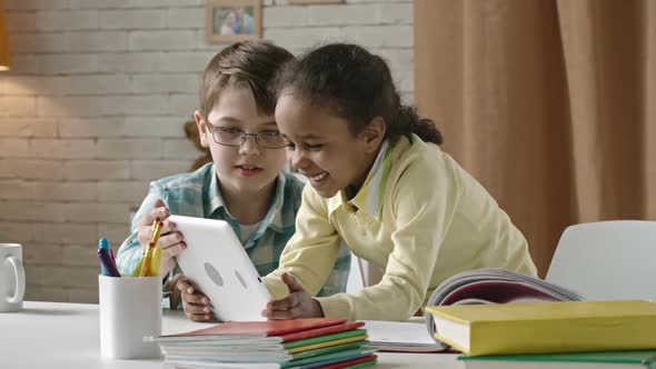 Children Watching Funny Cartoon on Tablet