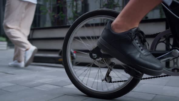 Closeup Male Legs Pedaling Riding Shared Bicycle