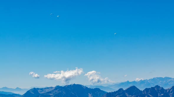 Paragliding above alpine peaks