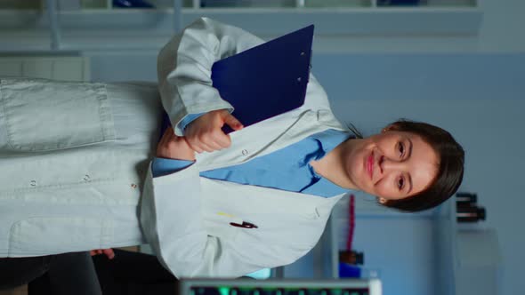 Vertical Video Portrait of Scientist Neurologist Researcher Looking at Camera Smiling