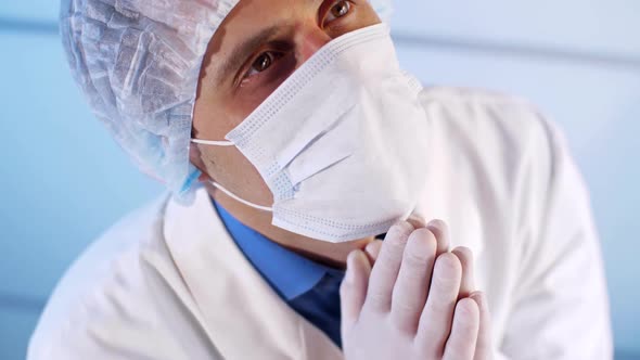 Physician Praying at the Office alt