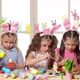 Happy Children Wearing Bunny Ears Painting Eggs on Easter Day - VideoHive Item for Sale