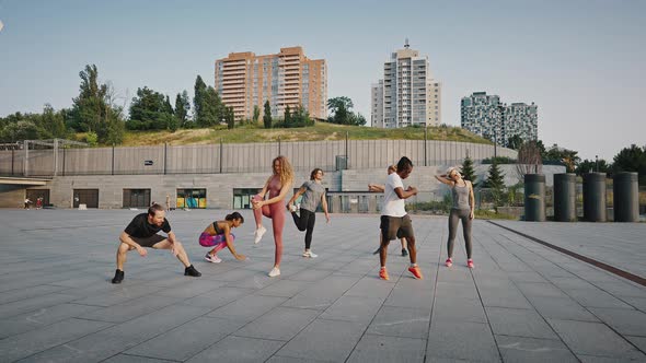 Group of Urban Runners Making Sport in an Urban Area