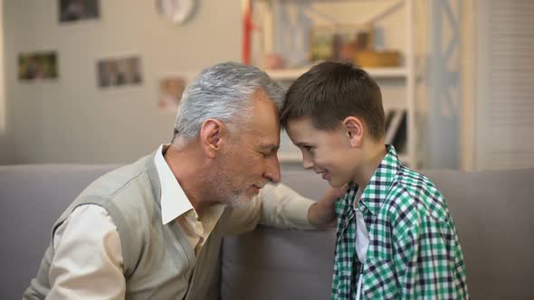 Aged Male and Boy Touching Foreheads, Friendship Between Grandpa and Grandson