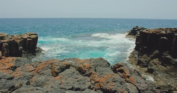 Natural Water Ocean Pools Along the Rocky Volcanic Coast Near to Little City Castillo Caleta De