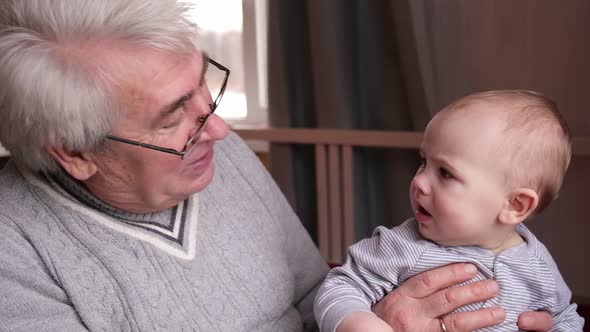 Family Relations of Elderly Man and Baby Girl