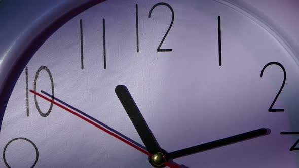 Clock Showing Ten Minutes Past Eleven. Close Up
