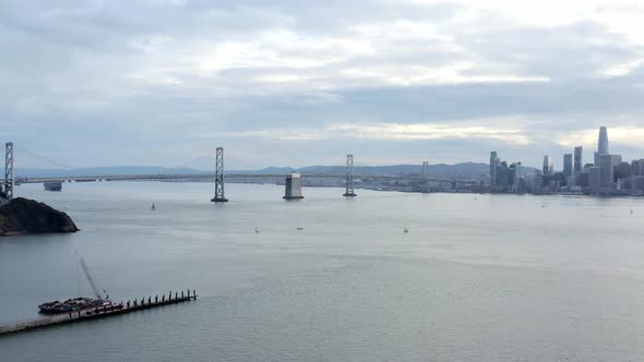 Aerial: Bay Bridge and San Francisco downtown, drone view