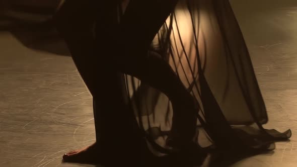 Delicate Sensual Contempt Performed By a Graceful Dancer. Close Up of the Legs of a Slender Woman