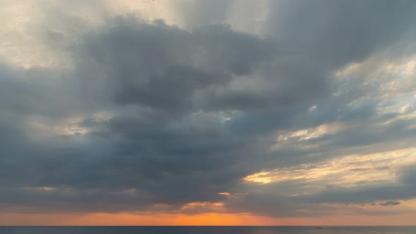 Time Lapse The Red Sun Was Obscured By Large Clouds.