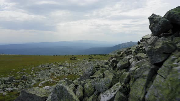 Aerial view. drone moving over the stone fields