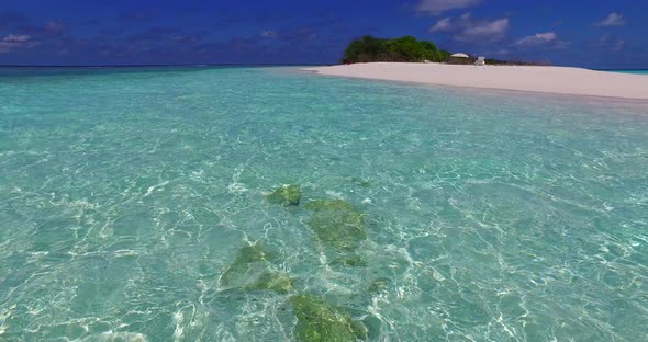 Wide angle fly over abstract view of a white sandy paradise beach and turquoise sea background