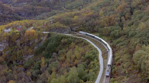 The Flam to Myrdal Train Passing Through Beautiful Landscapes