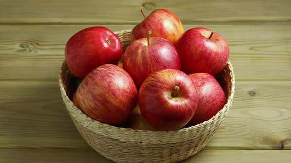 Basket with fresh picked homegrown colorful apples 