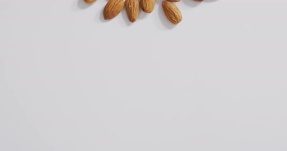 Video of almonds on white background