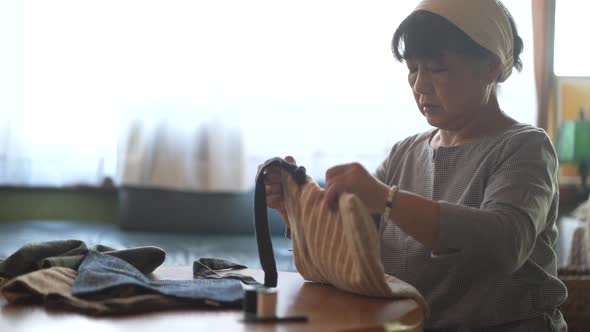 woman making a bag