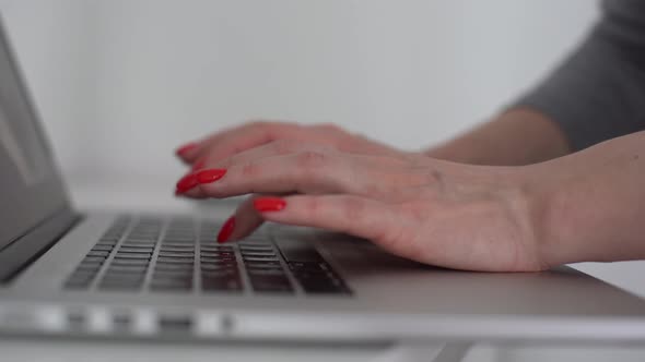 Woman Freelancer Working on Laptop at Homeoffice