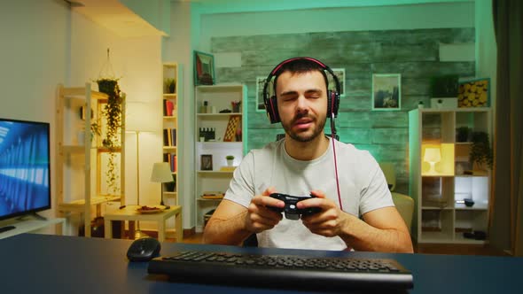 Pov of Young Man with Headphones in in a Room with Neon Light