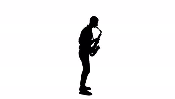 Dark Silhouette of a Musician Who Plays the Saxophone on a White Background