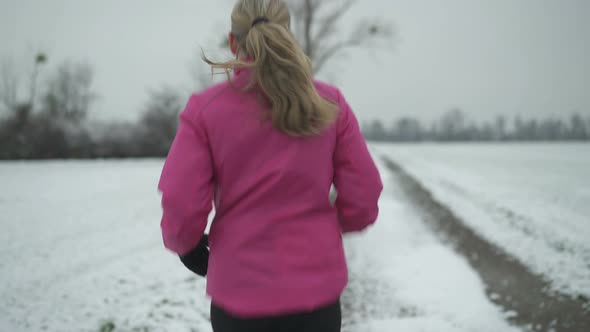 Following Running Woman With Long Hair