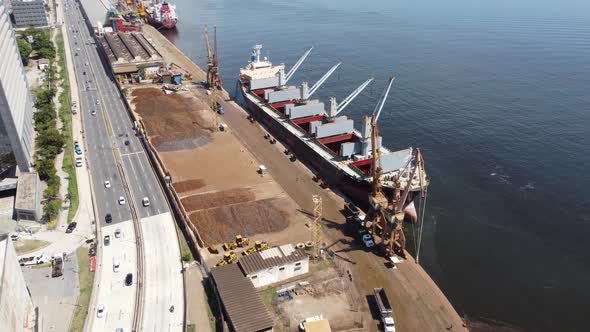 Container cargo freight ship at landmark Rio de Janeiro harbor.