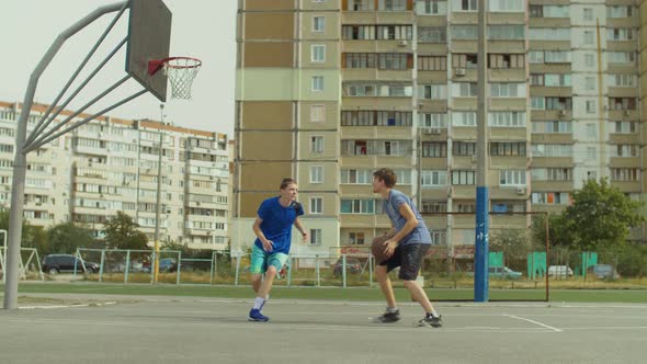 Streetball Player Taking Jump Shot on Basketball Court