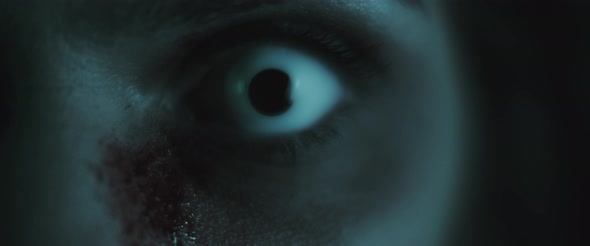 Terrifying creepy zombie woman, close up of white eye. Scary look. BMPCC 4K