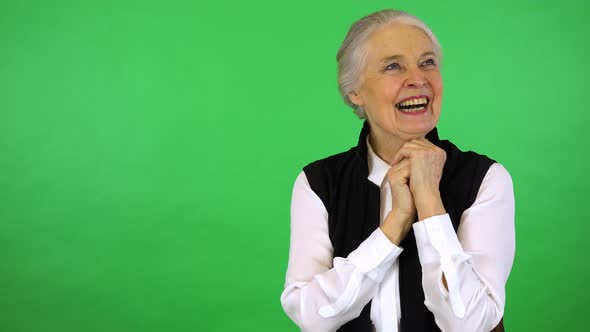 An Elderly Woman Celebrates - Green Screen Studio