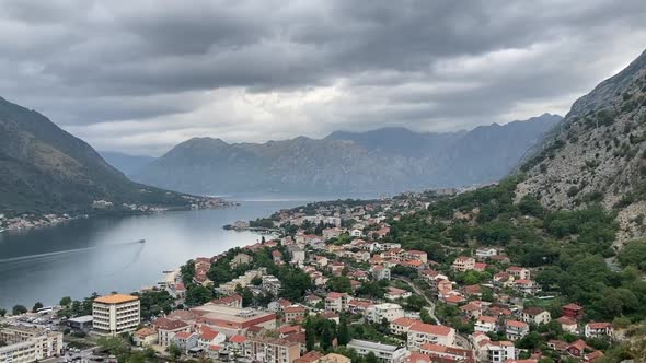 The camera pans left over the town of Kotor and Lovcen mountain, Montenegro