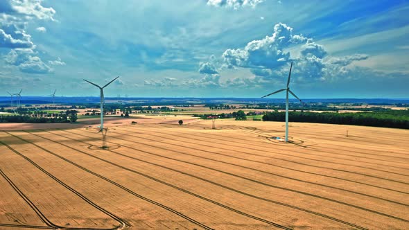 Wind turbines on field. Alternative energy in Poland.