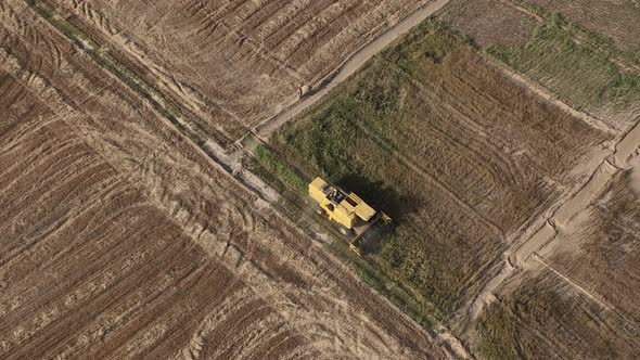 Static shot of a tractor in the field