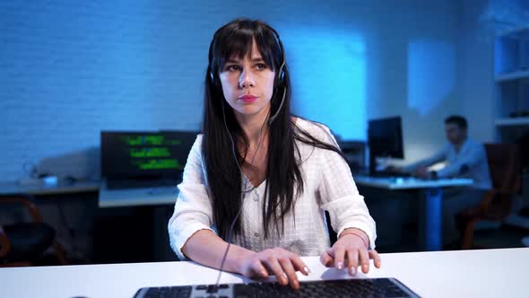 Middle Shot of Slim Confident Beautiful Woman Typing on Computer Keyboard Leaning Back and Taking