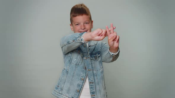 Cheerful Child Boy Showing Hashtag Symbol with Hands Likes Tagged Message Popular Viral Content