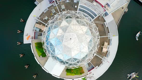 Modern Exterior Of Science World At False Creek In Vancouver, British Columbia, Canada. aerial top-d